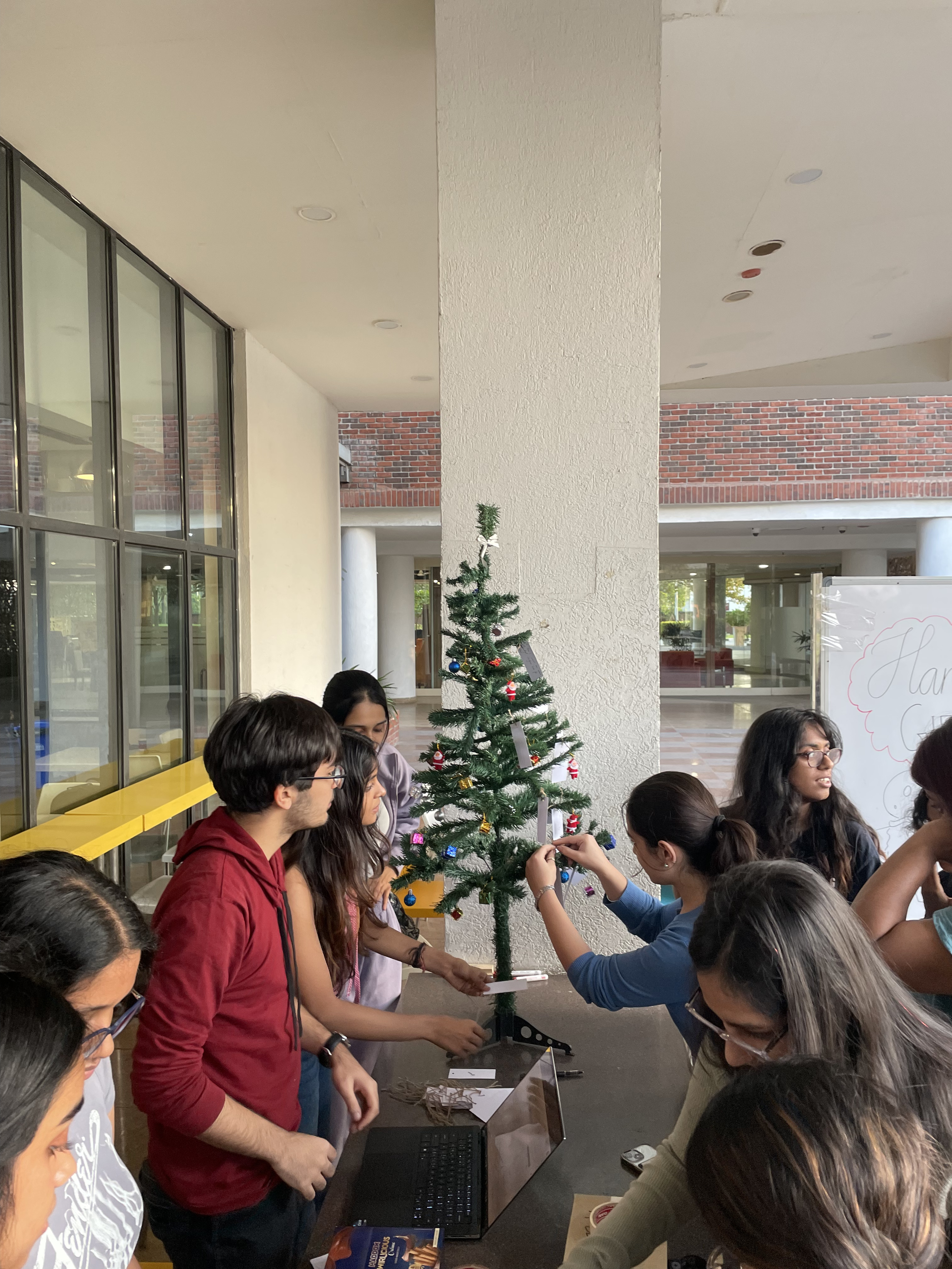 Students decorating the wish-giving tree
